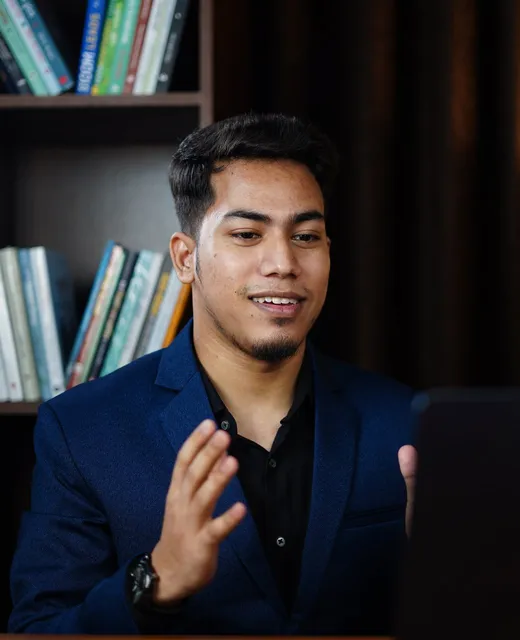 Miraj explaining an idea during a video call